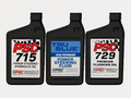 Renderings of PSC 715, PSC 8061 Tru Blue and PSC 729 flushing oil bottles on a white background for the category of steering fluids. 