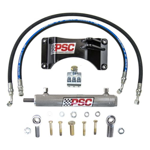 PSC steering components including a steering cylinder, tie rod clamp and clevis ends with hoses and hardware on a white background. 