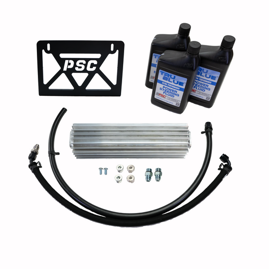 Automotive parts including a black PSC bracket, two black connectors, a black hose, and metal sleeves on a white background.