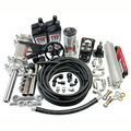 Full hydraulic steering kit with a double-ended PSC brand cylinder, four PSC 715 bottles, a PSC reservoir, black orbital, silver cooler, belt, clevis ends, hoses, fittings and hardware in front of a white background. 