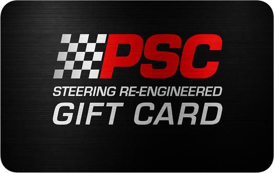 Black metallic gift card with PSC logo and text showing "Steering Re-Engineered" and "Gift Card" on a white background. 