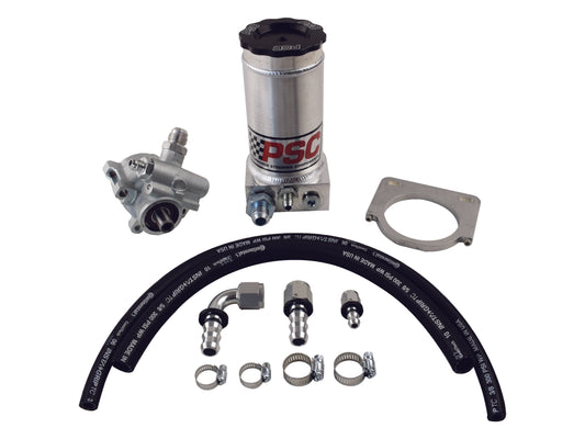 PSC pump kit featuring components including a PSC silver reservoir, silver pump, two black rubber hose, hose fittings and clamps on a white background.