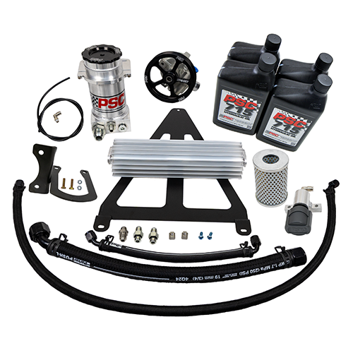 Complete PK20JP1 power steering pump kit for Jeep YJ models, including high-performance pump, fluid bottles, hoses, cooler, mounting brackets, pulley, filter and hardware arranged on a white background.