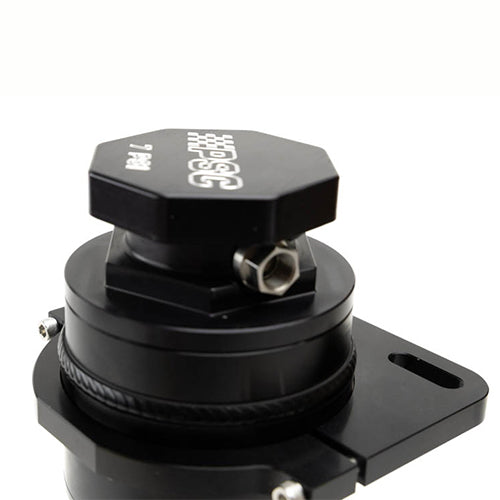 Close up and angled view of a black steering reservoir cap component with 'PSC' branding on a white background. 