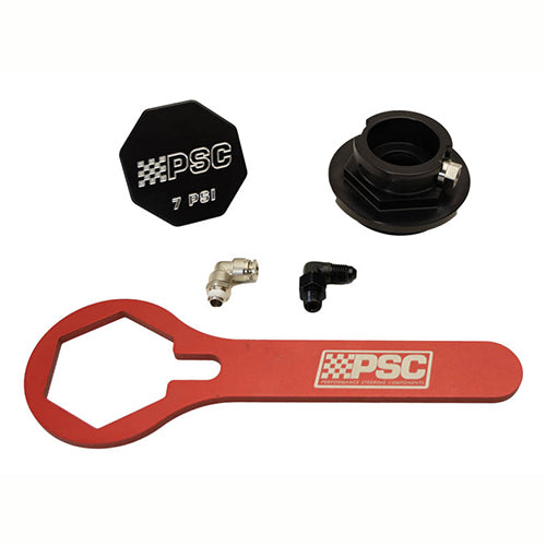 PSC High Performance Remote Reservoir Cap Conversion Kit including a red tool, black cap and connectors on a white background.