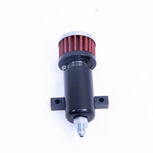 A black cylindrical automotive oil filter with a red pleated top section, a silver metal band, and a silver threaded fitting at the bottom, shown on a plain white background.