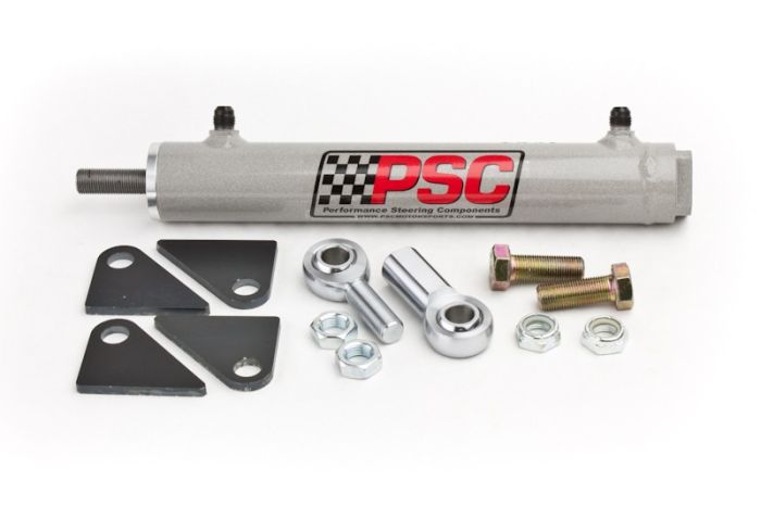 PSC steering cylinder kit with grey PSC with logo, mounting brackets, clevis and tie rod ends, bolts and nuts on a white background. 