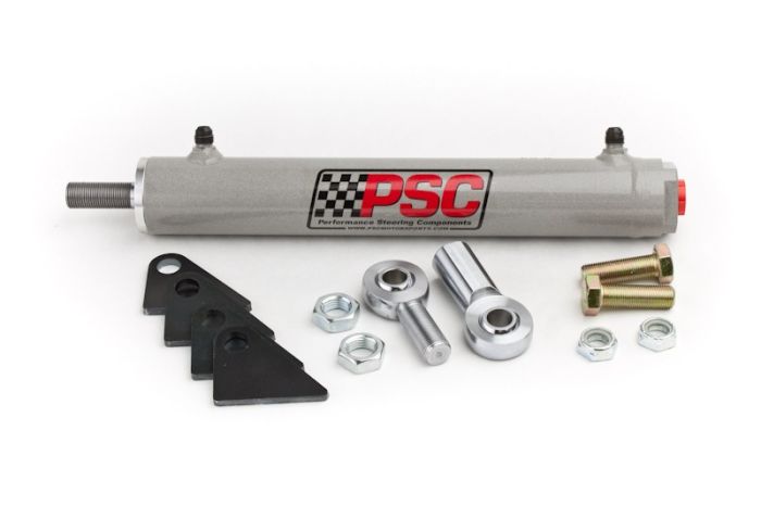 PSC steering cylinder kit with grey PSC with logo, mounting brackets, clevis and tie rod ends, bolts and nuts on a white background. 