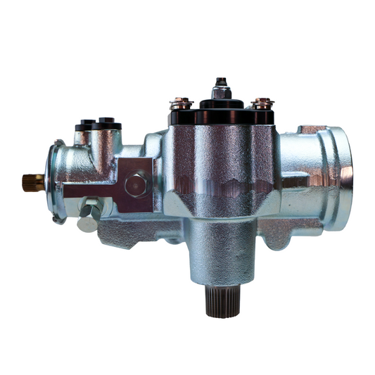 Angled front view of a silver PSC steering gear showing bronze input shaft, black anodized top cap, and precision port fittings.