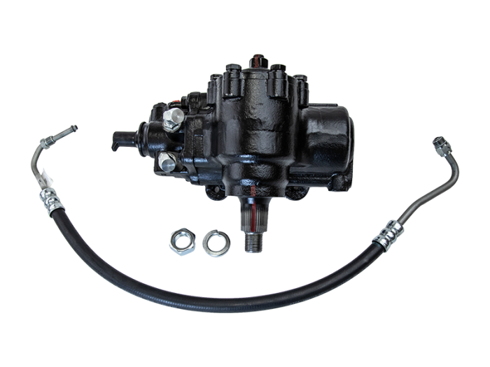 Black mechanical component with hoses and nuts on a white background