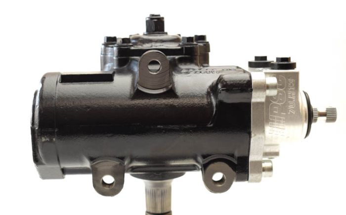 PSC Big Bore XD® steering gear with black and silver anodization for use with 2nd gen Dodge RAM trucks to fir n 1994-2002 RAM 2500/3500 on a white background. The angle from the side it mounts on.