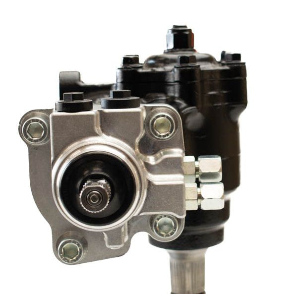 PSC Big Bore XD® steering gear with black and silver anodization for use with 2nd gen Dodge RAM trucks to fir n 1994-2002 RAM 2500/3500 on a white background. Angle 3 showing the spline.