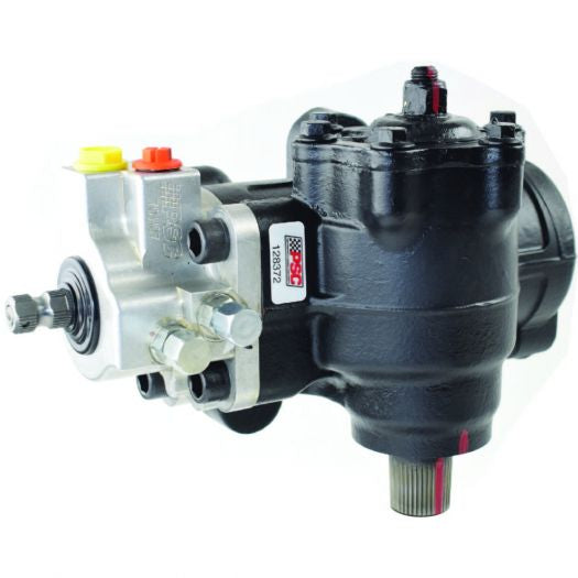 Black mechanical component with various ports and connectors on a white background