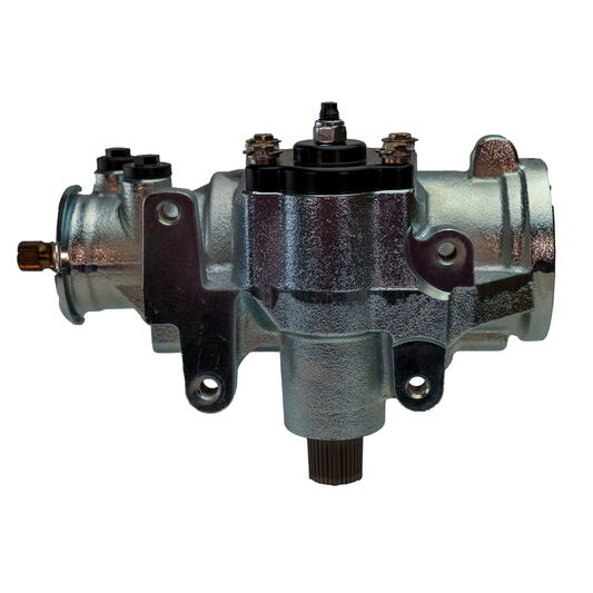 Side profile of silver PSC steering gear with mounting brackets visible, displaying a durable cast housing and precision-machined fittings.