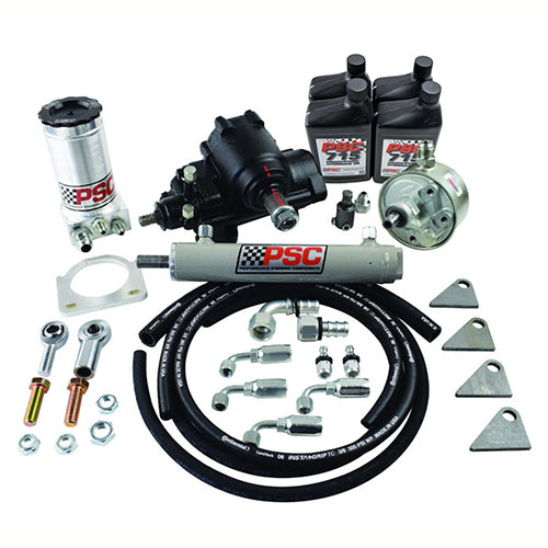 Steering kit with gear, cylinder, four PSC 715 bottles, pump, clevis joints, hoses, fittings, hardware, mounts, reservoir and clamp in front of a white background. 