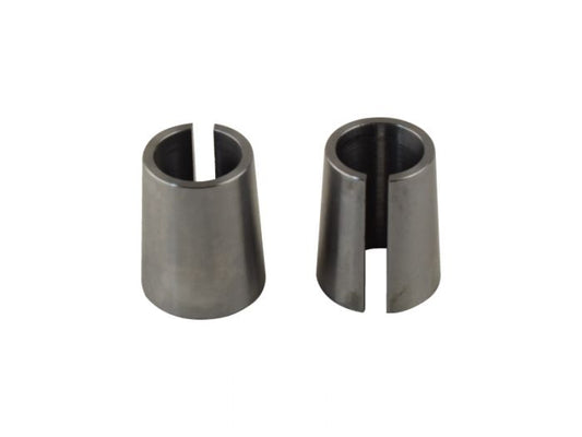 Two metal bushings on a white background