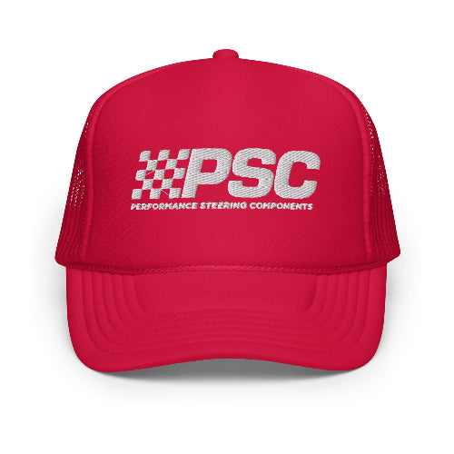 Product markup of a red foam trucker hat with a PSC logo embroidered in white - with a white background.