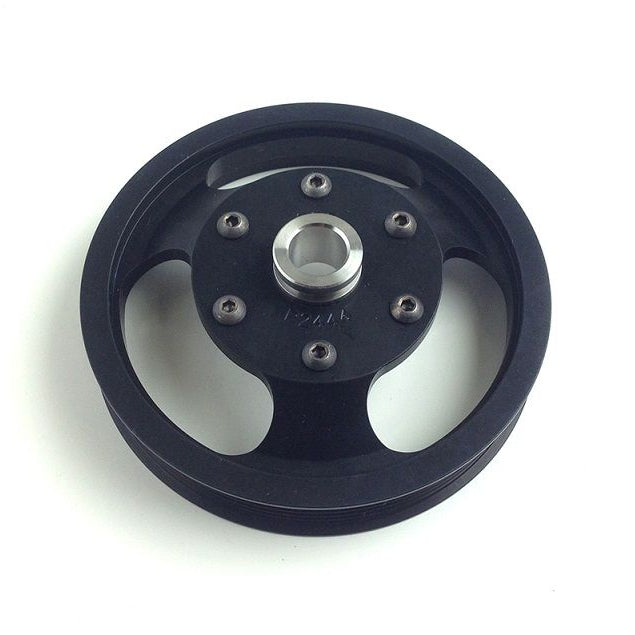 Black pulley wheel with metal center on a white background