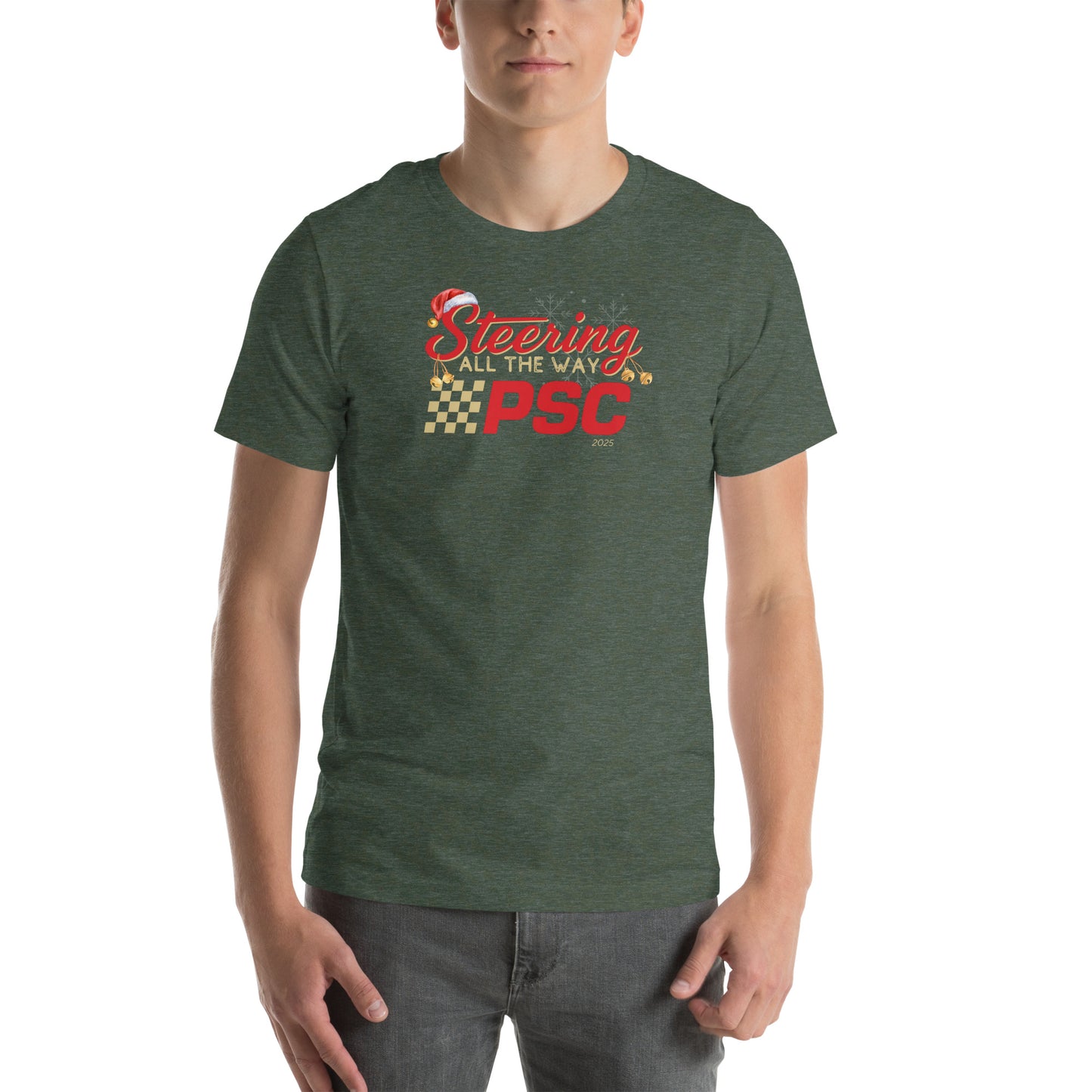 Front view of an adult model wearing a heather forest green short-sleeve T-shirt with a PSC logo and the phrase ‘Steering All the Way PSC 2025’ printed across the chest in red and gold lettering. There is a Santa hat on the "S" in steering, bells handing off the bottom of the "S" and "g" in steering and translucent snowflakes in the background as well as "2025" right bottom corner offset.