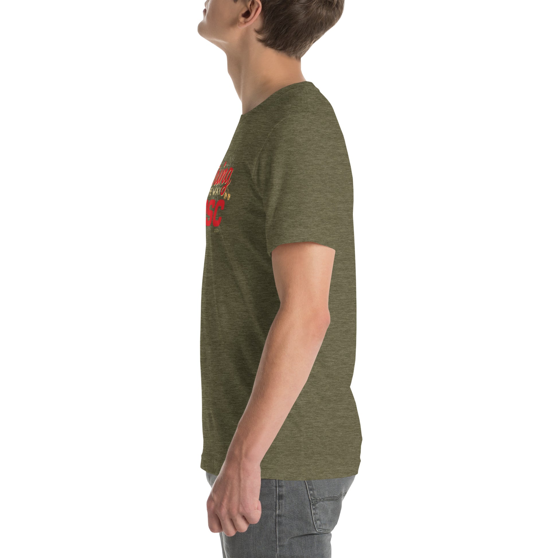 Side view of an adult model facing the left edge of the screen wearing a heather olive green short-sleeve T-shirt you can see the edge of a red and gold design on the front of the shirt. The background is white. 